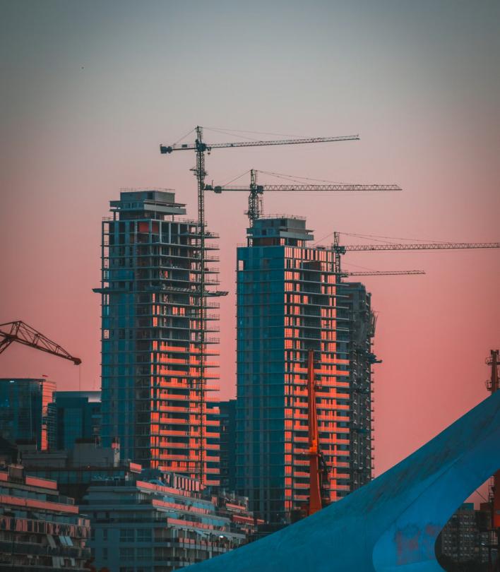 Tower cranes over Binastra developments under construction
